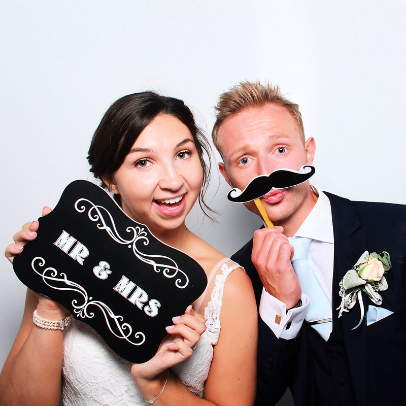 Mr and Mrs in the wedding photo booth